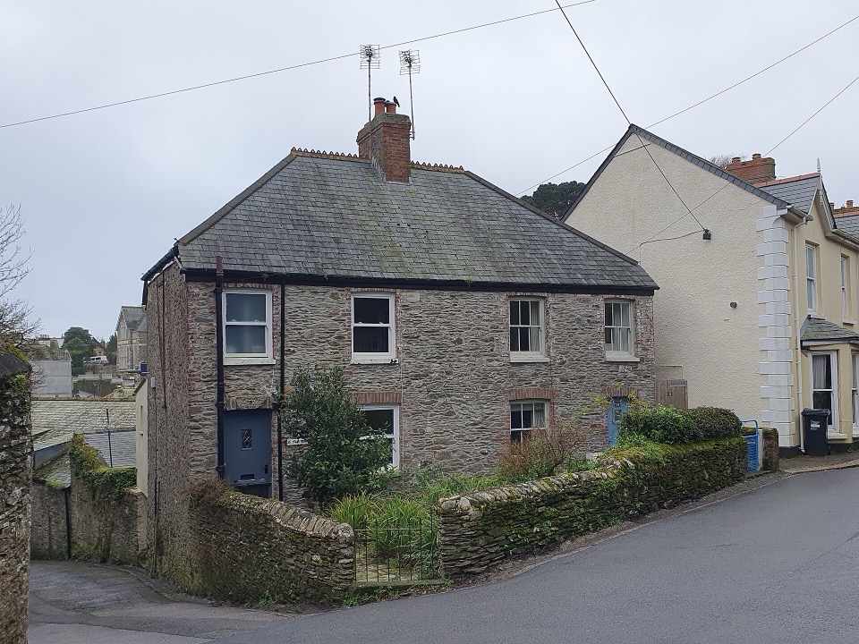 Stone built semi detached houses on Place Road in Fowey, Cornwall